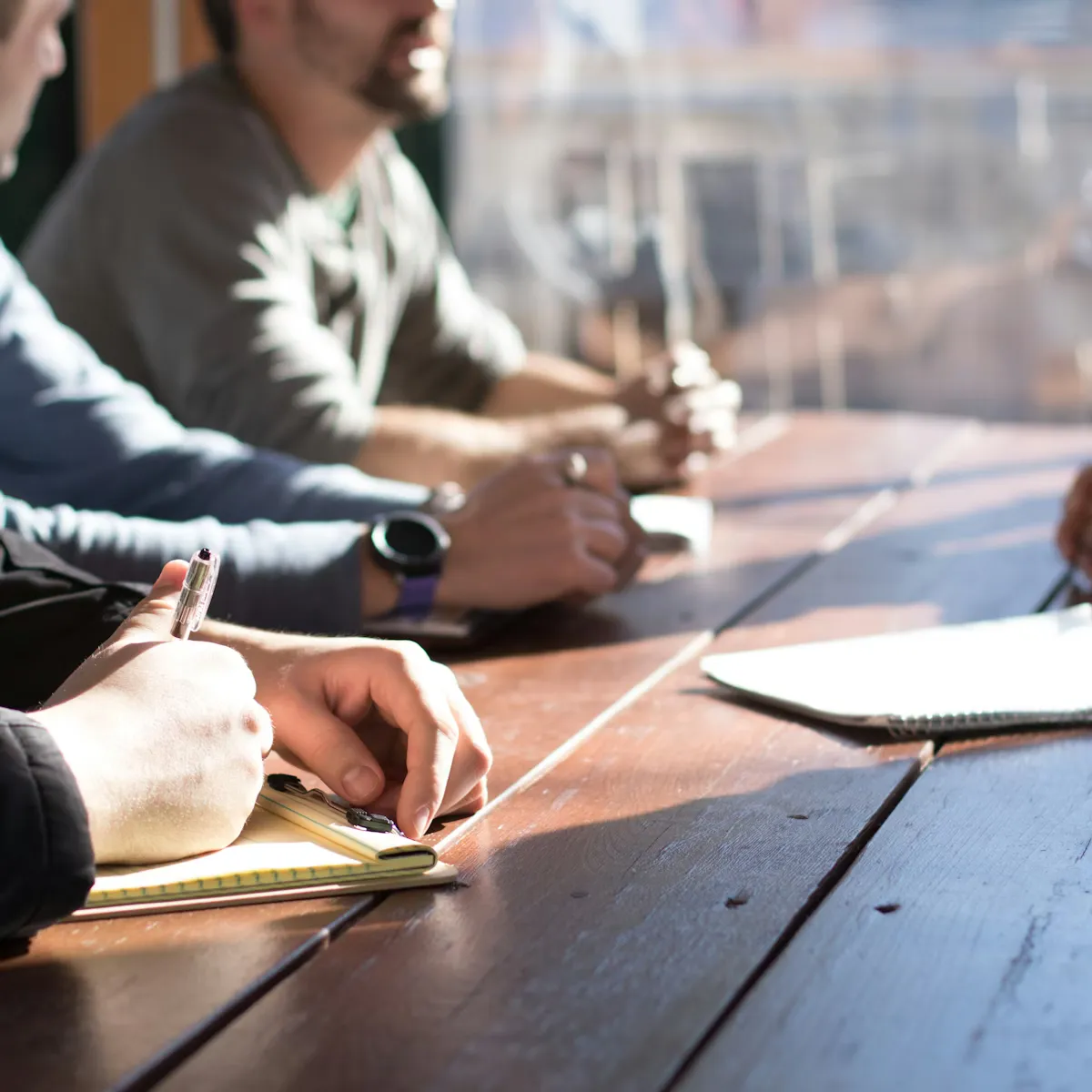 Engineering team collaborating in a technical review meeting